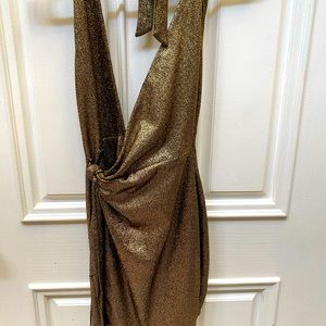 Wore once sharp sexy dress. Low front open back. Holidays